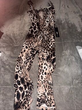 Brand new Fqshion Nova Animal slim
fit Leg Jumpsuit - Black & Cream